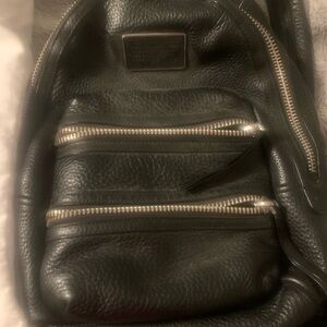 Black leather medium sized Marc Jacob’s backpack